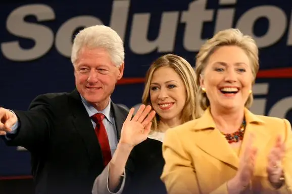 Bill, Chelsea and Hillary Clinton in 2008
